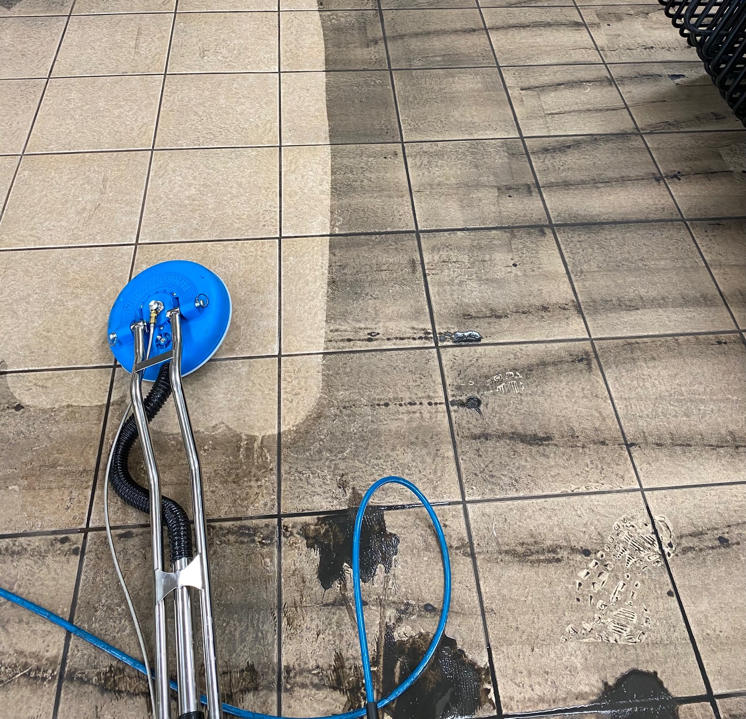 Tile and grout cleaning in progress